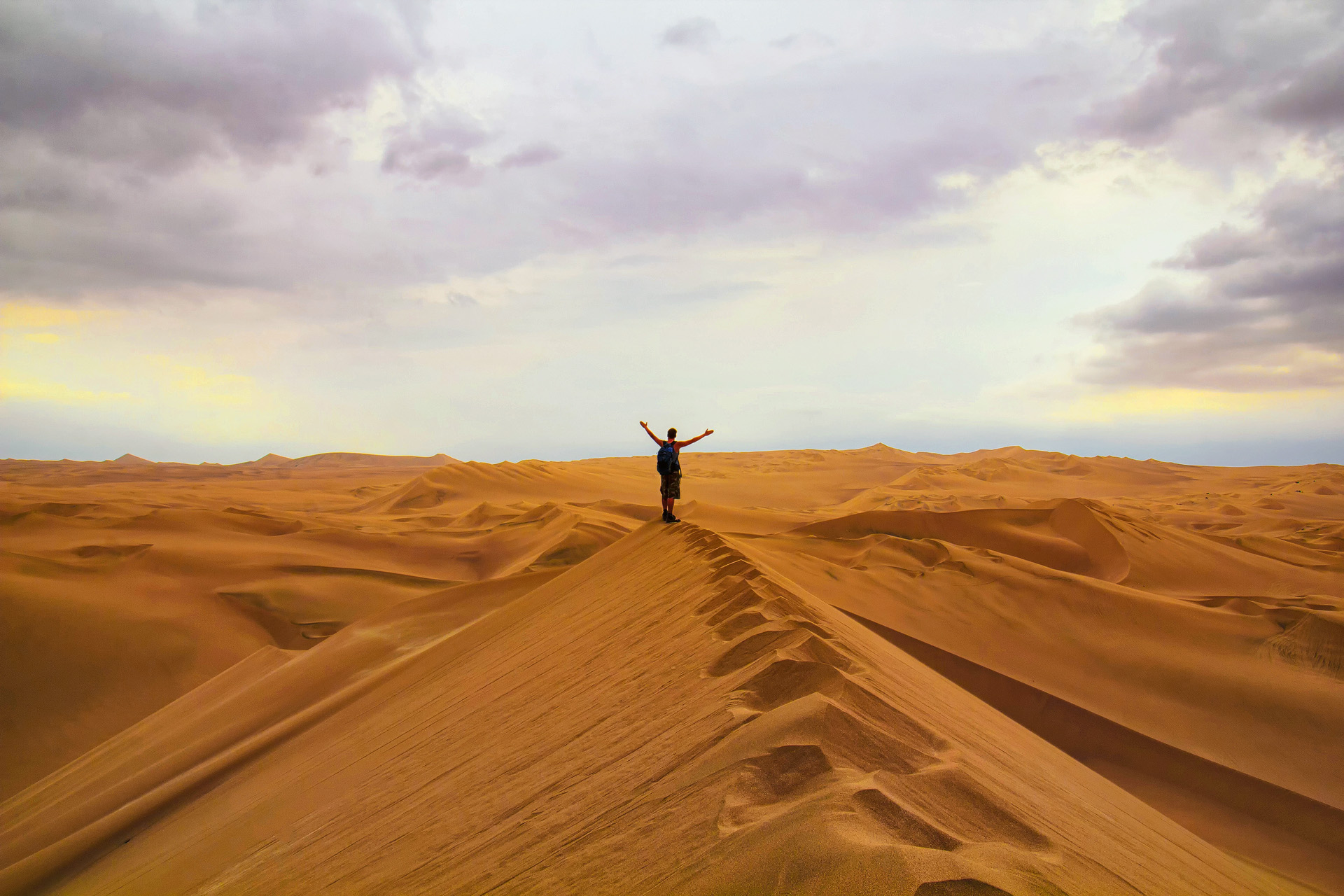 sand dunes, oasis, men on dunes, footsteps,